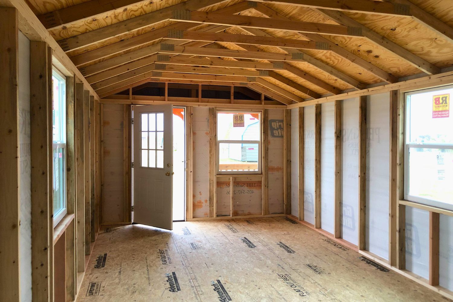 Hot to finish an unfinished cabin shell: view of portable cabin with focus on unfinished floor